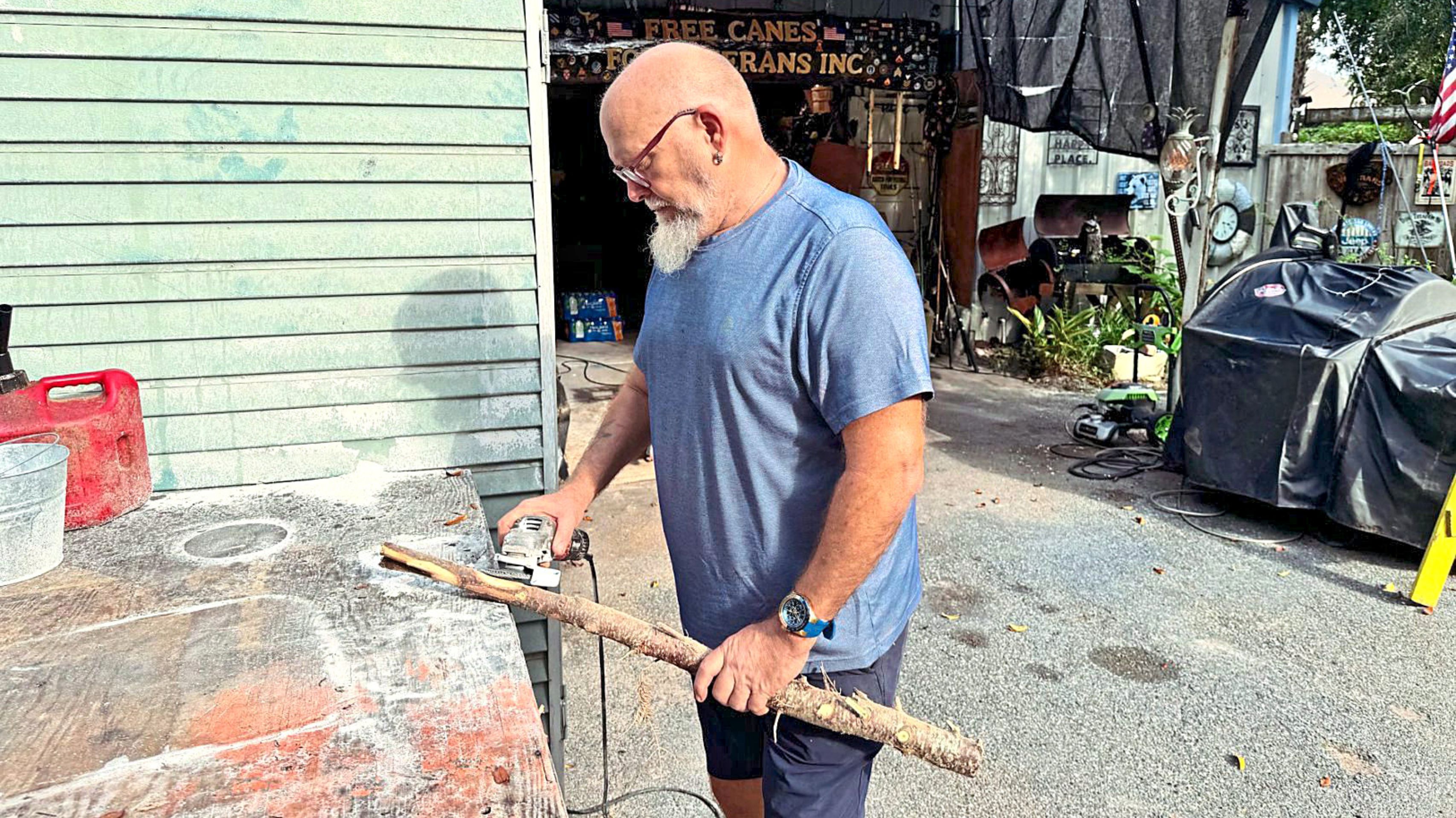 “It’s what God wanted me to do,” says Oscar of making canes for veterans