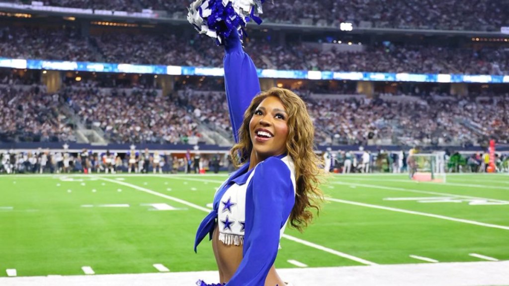 Armani Latimer cheering at a Dallas Cowboys game
