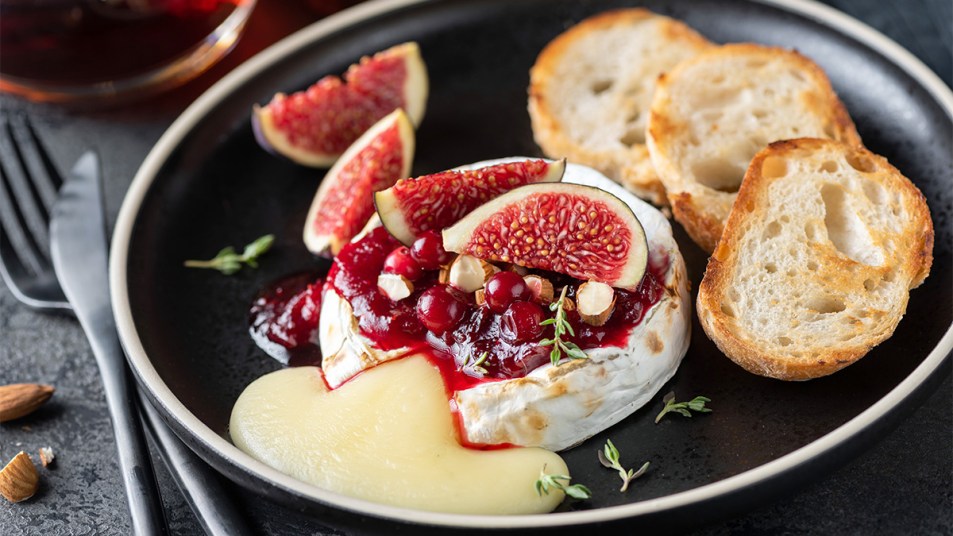 Baked brie topped with jam and figs