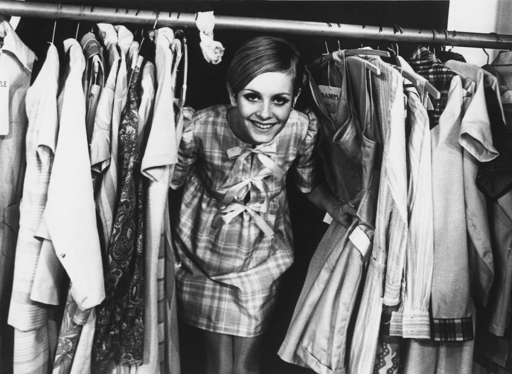 Twiggy poses with dress from her fashion line in 1967