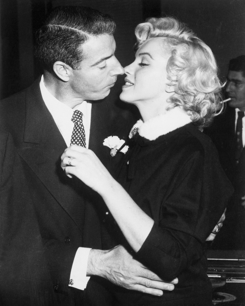 Joe DiMaggio and Marilyn Monroe on their wedding day, 1954