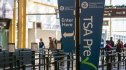 A TSA PreCheck sign in an airport