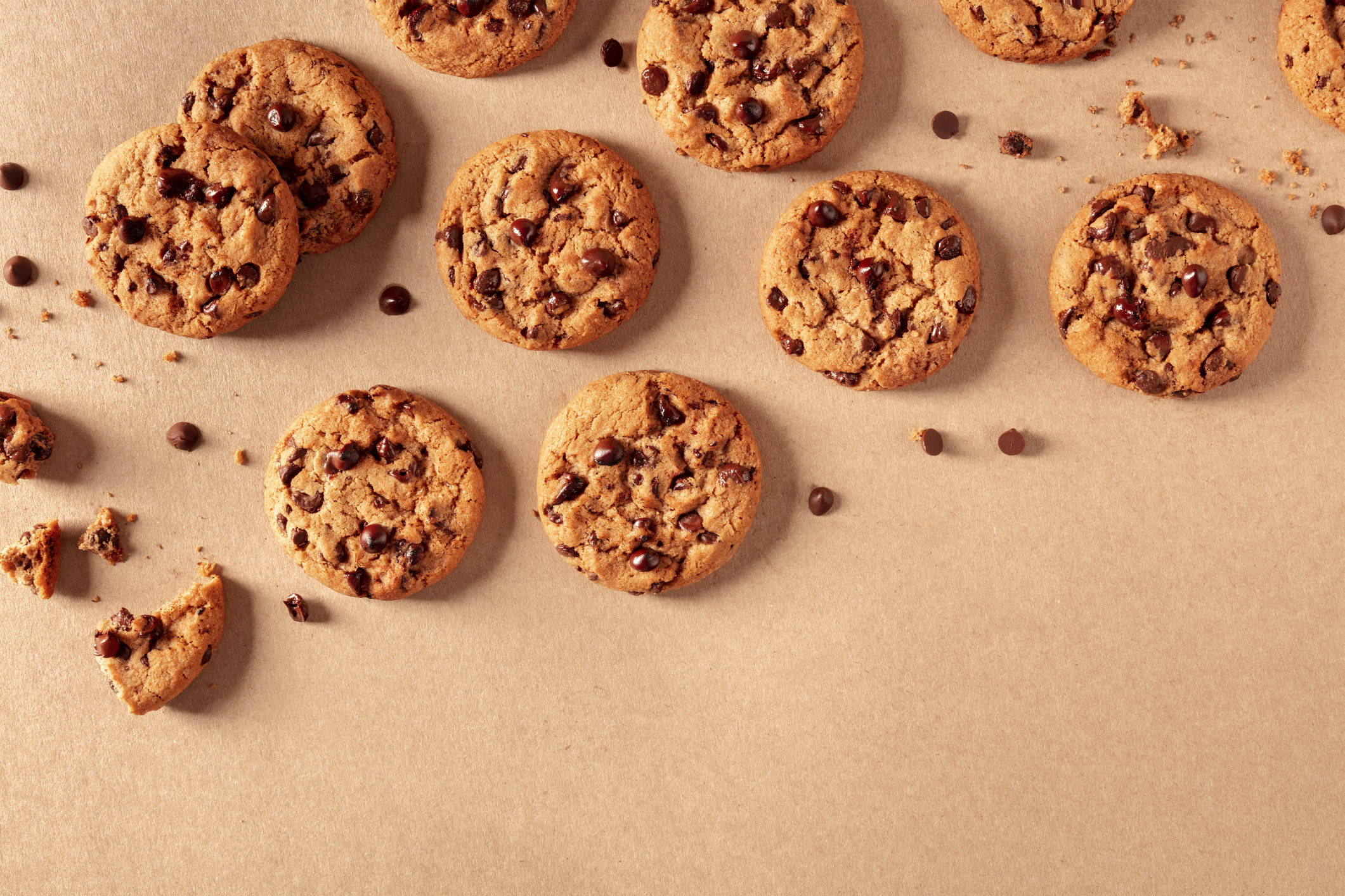 Chocolate chip cookies on a brown background