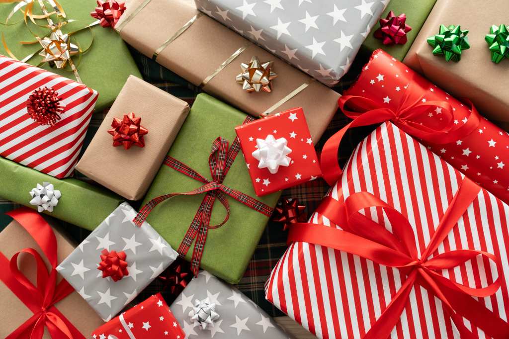 Christmas gift boxes, festive wrapped presents composition. Winter holiday season gifts.