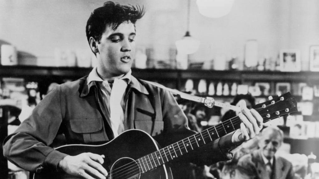 Man playing a guitar ; Best Elvis movies