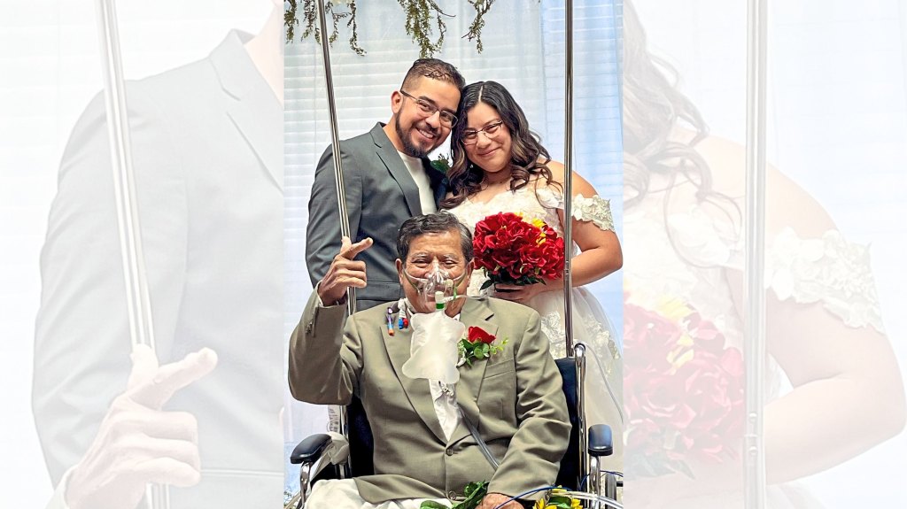 Bride and groom with the father
