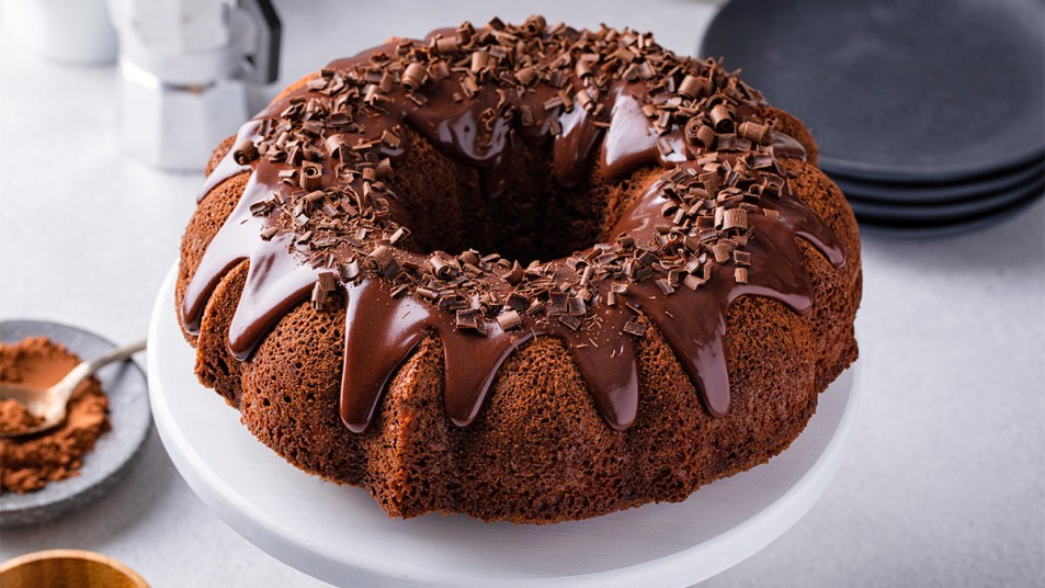 Chocolate pound cake topped with ganache and chocolate shavings