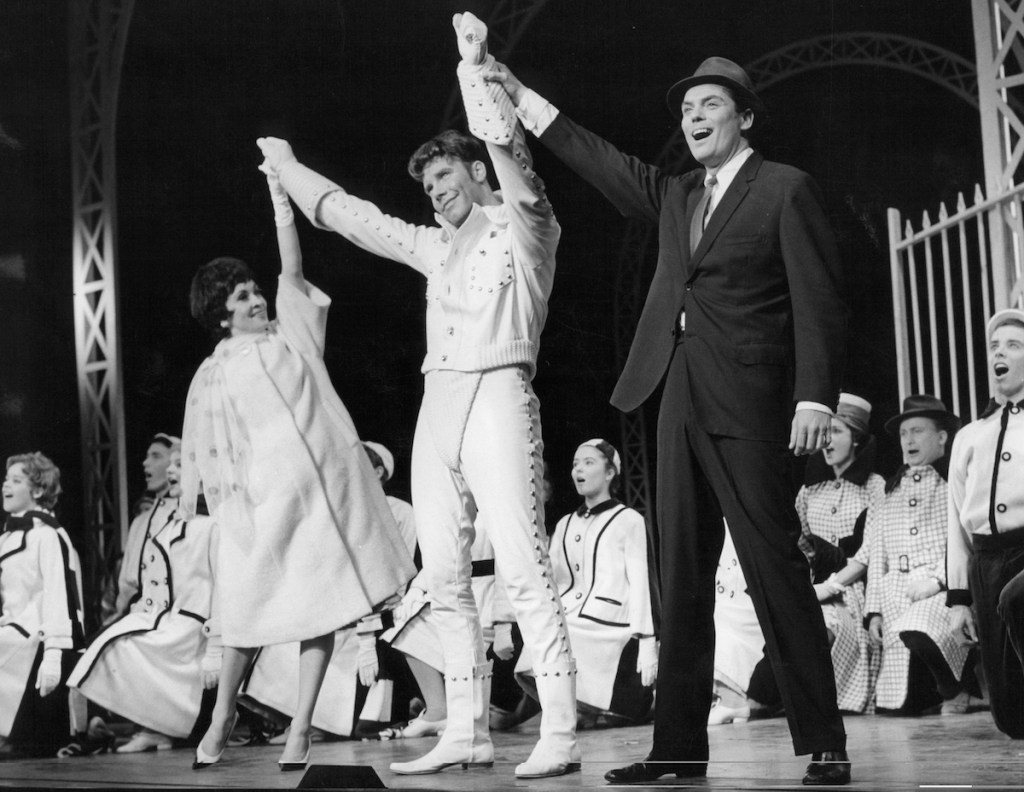 Left to right: Chita Rivera, Marty Wilde and Peter Marshall take a bow in the London production of  'Bye Bye Birdie,' 1961