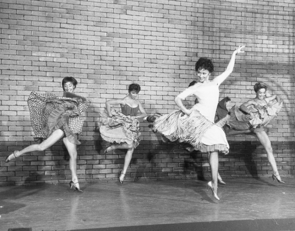 Scene from the Broadway musical "West Side Story," L-R: Lynn Ross, unnamed actress, Chita Rivera, and Carmen Guitterez