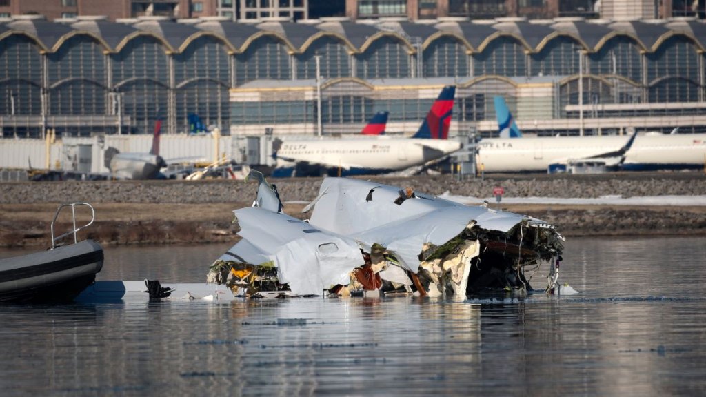 The Coast Guard investigates aircraft wreckage on the Potomac River