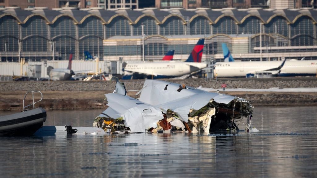 The Coast Guard investigates aircraft wreckage on the Potomac River