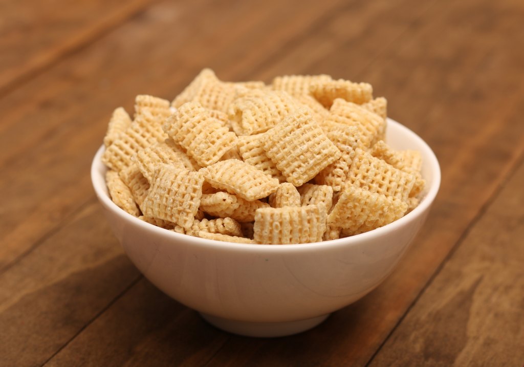 Chex corn cereal squares in bowl