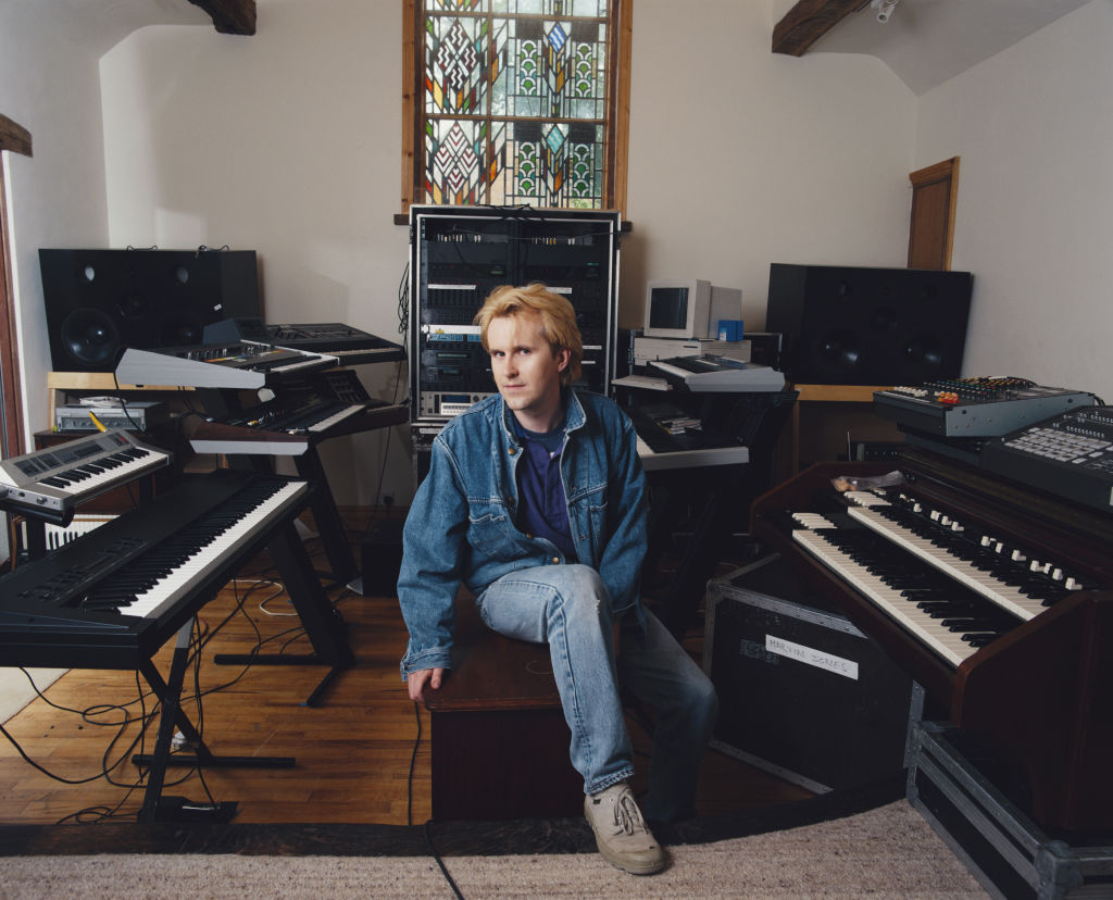 man sitting in music room