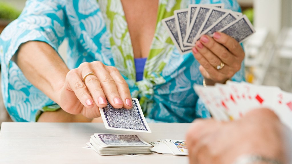 Two women playing cards