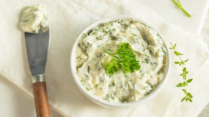 Whipped herb-infused butter in a bowl