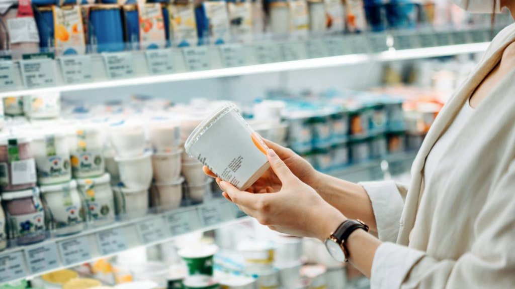 Woman looking at ingredients label