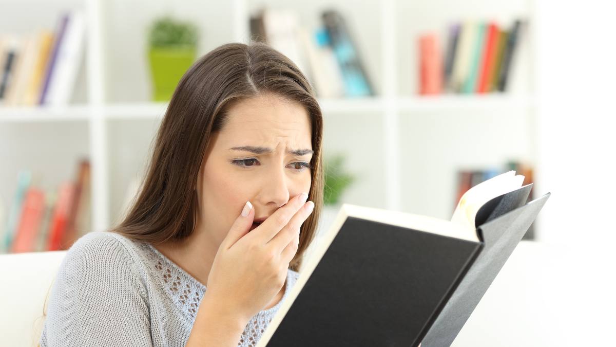 Woman shocked while reading
