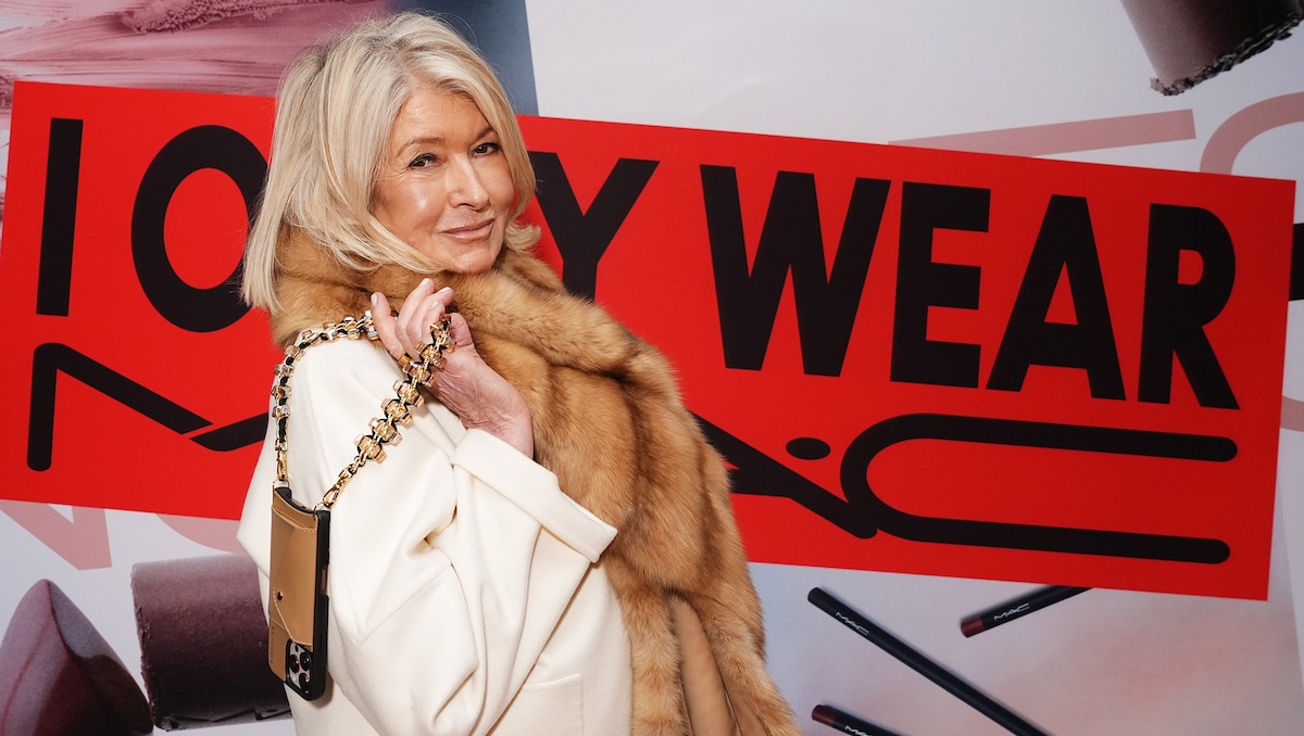 Martha Stewart poses with her Bandolier crossbody phone case at the I Only Wear MAC Event at MAC Soho on February 06, 2025.