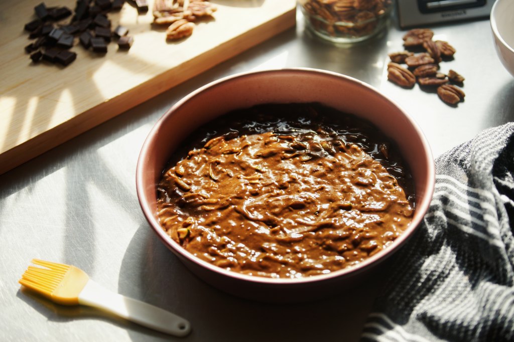 Preparation of melting brown sugar and butter to make pecan pralines