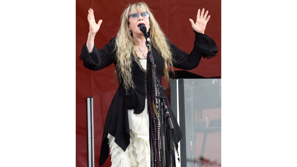 Fleetwood Mac singer performing on stage in 2022