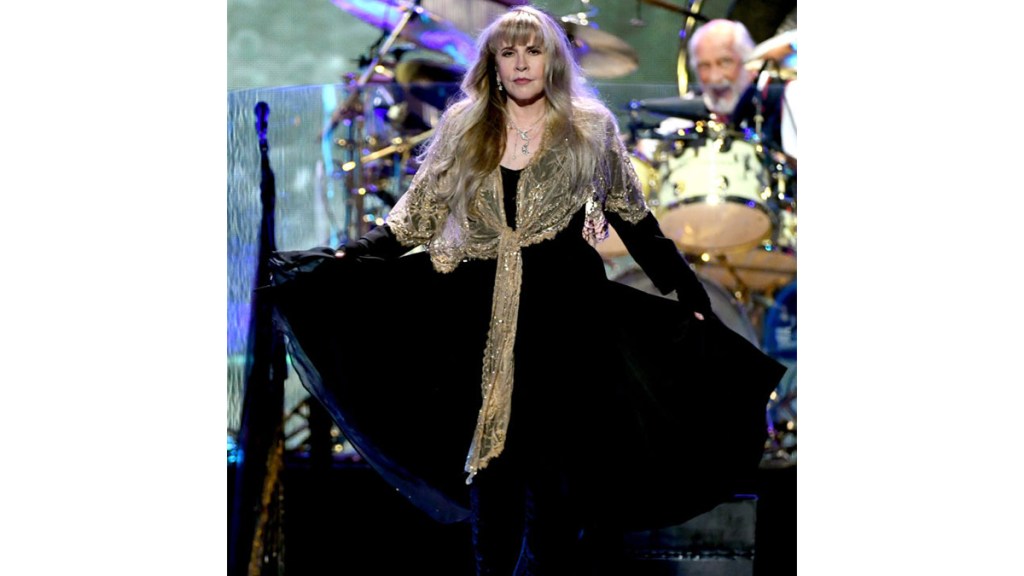 Fleetwood Mac singer wearing gold shawl