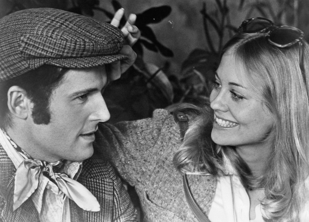 Cybill Shepherd with her arm around Charles Grodin in a scene from the film 'The Heartbreak Kid', 1972