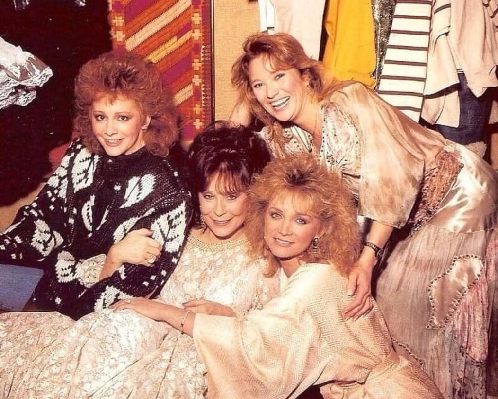 Reba (left), Loretta Lynn (left middle), Barbara (right middle) and Tanya Tucker (right) always cheer each other on and set an example for the future women in Country