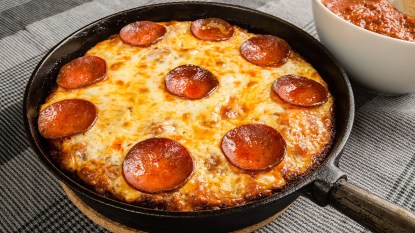 Pizza baked in a skillet as part of a plan to eat pizza and lose weight