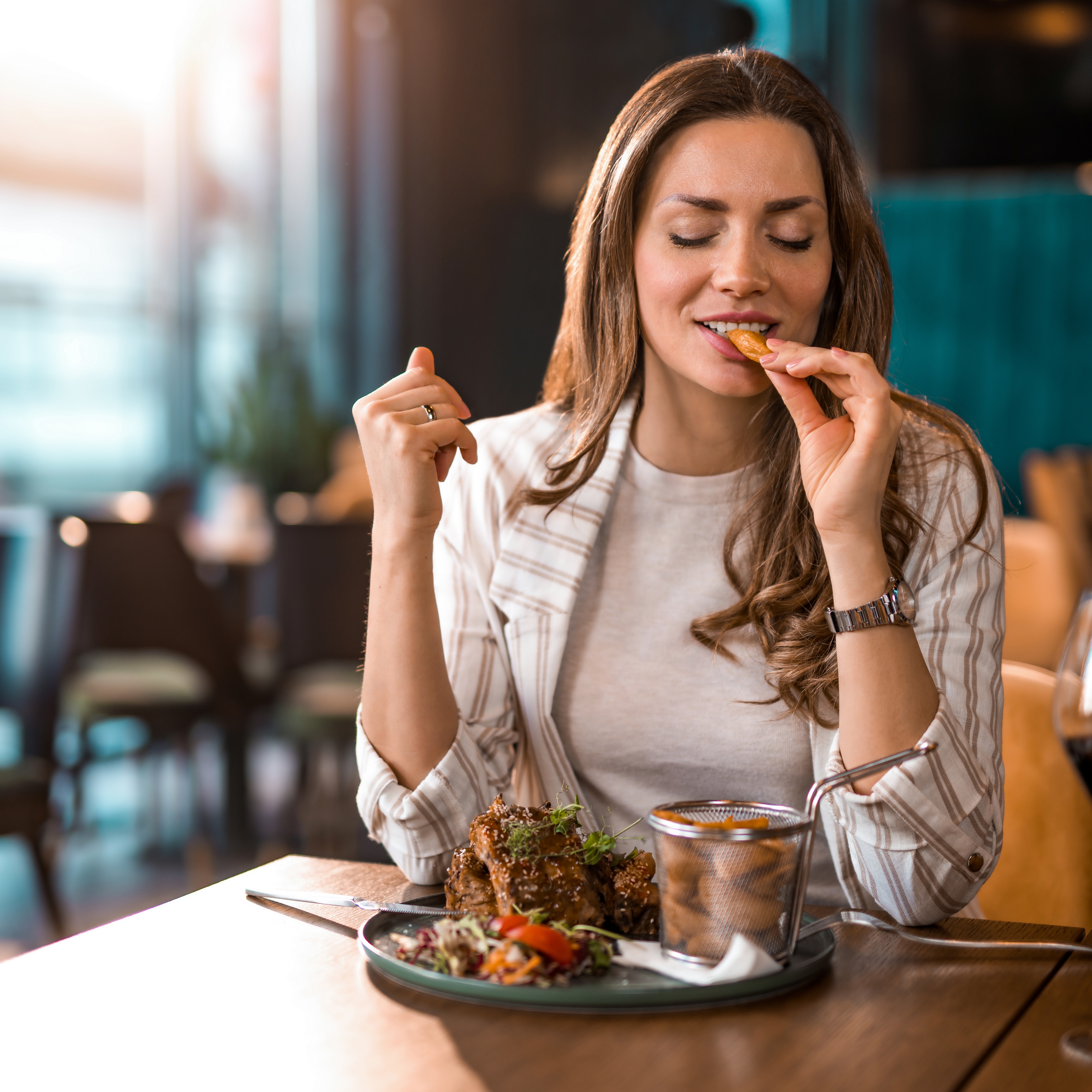 Woman savoring her meal