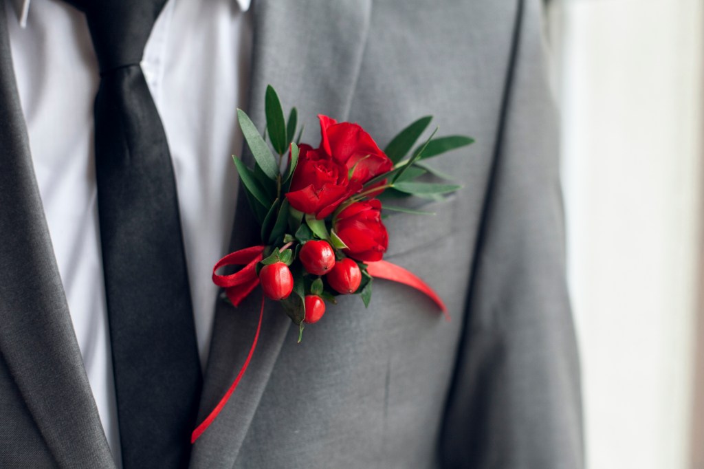 Red flowers on suit jacket
