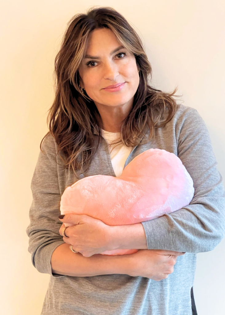 Mariska Hargitay holding her Hugimals heart-shaped pillow
