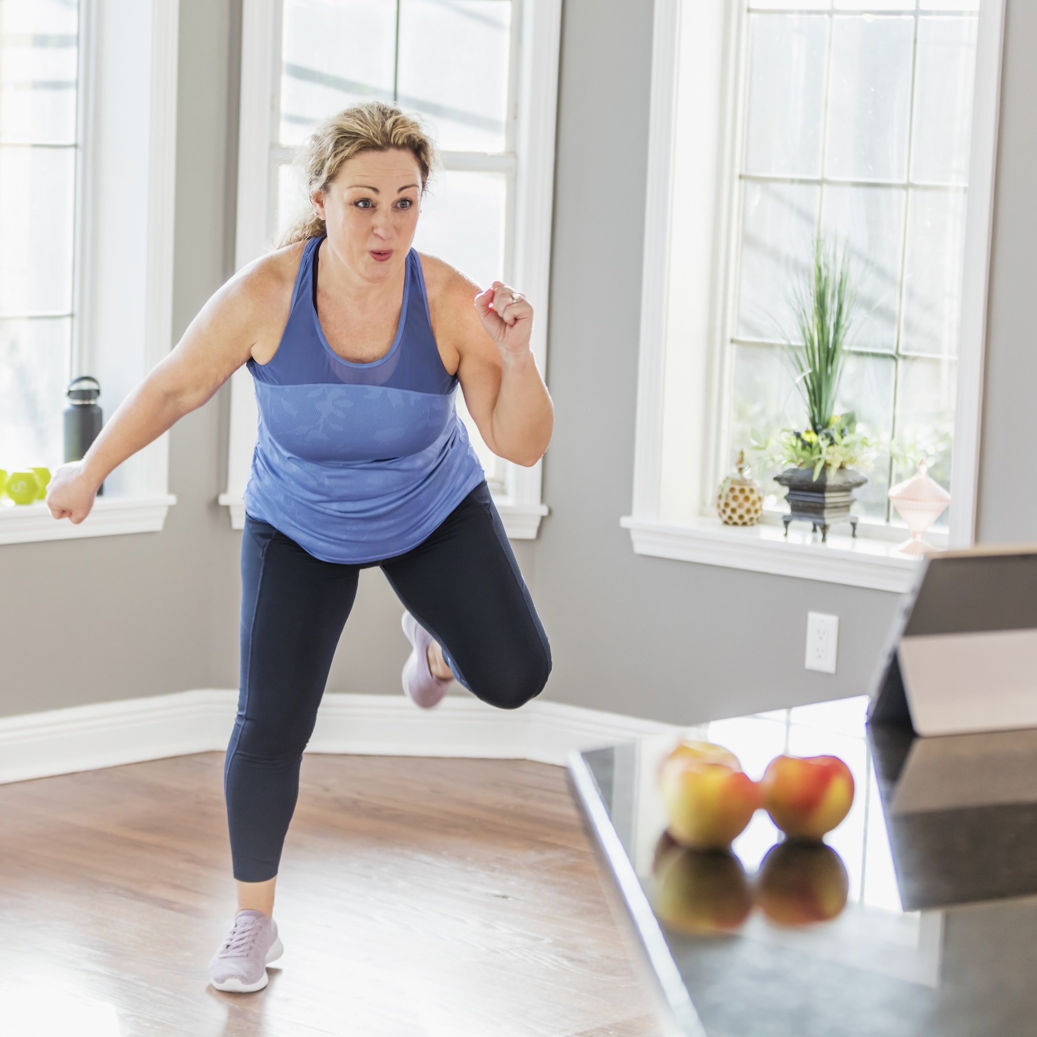 woman at home doing dance for weight loss