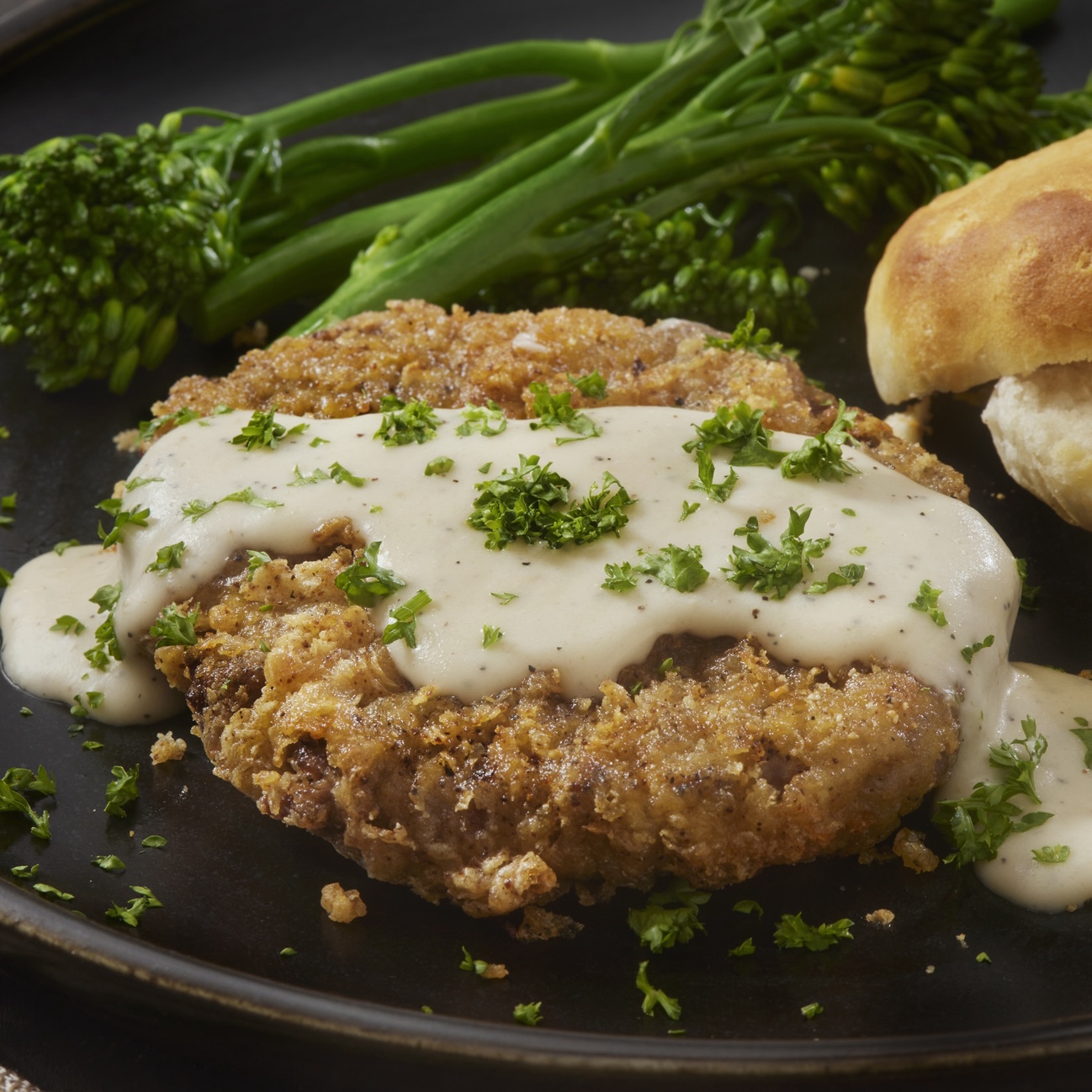 Ree Drummond's chicken fried steak with gravy on top