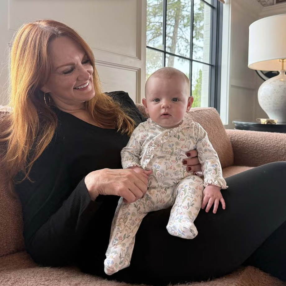 ree drummond holding and smiling at baby granddaughter sofia during easter weekend