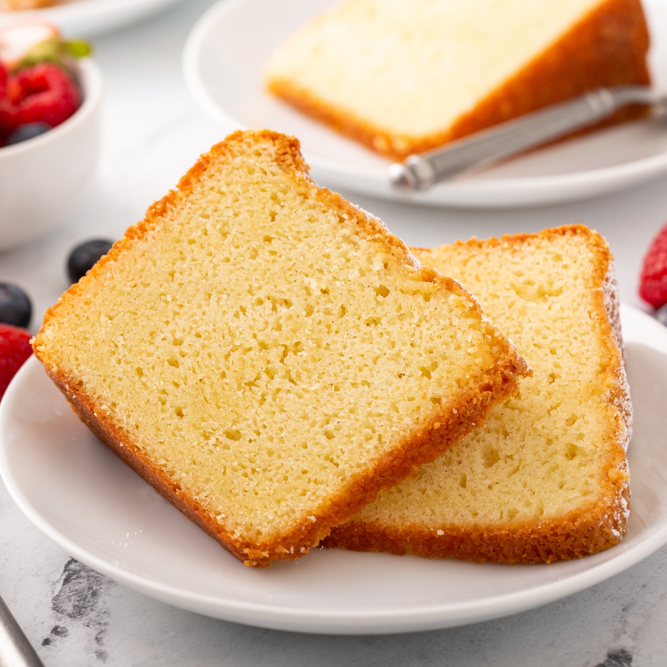 Slices of Ina Garten's honey vanilla pound cake