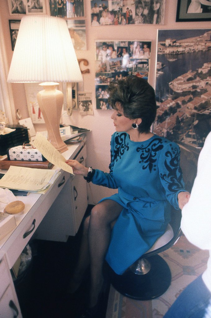 Joan Collins reads script in her dressing room on the set of hit show soap opera Dynasty