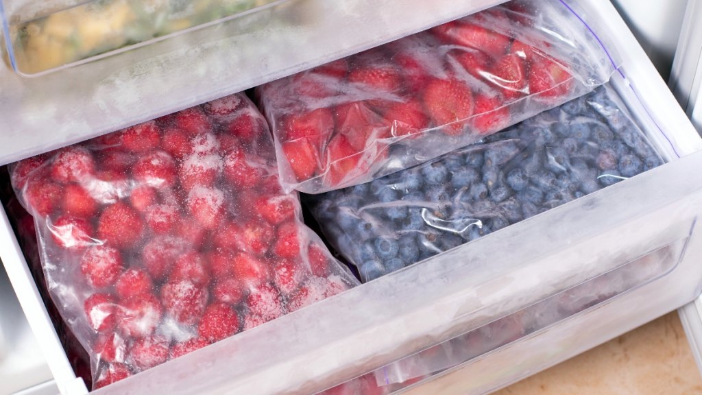 Frozen fruits organized together in a freezer