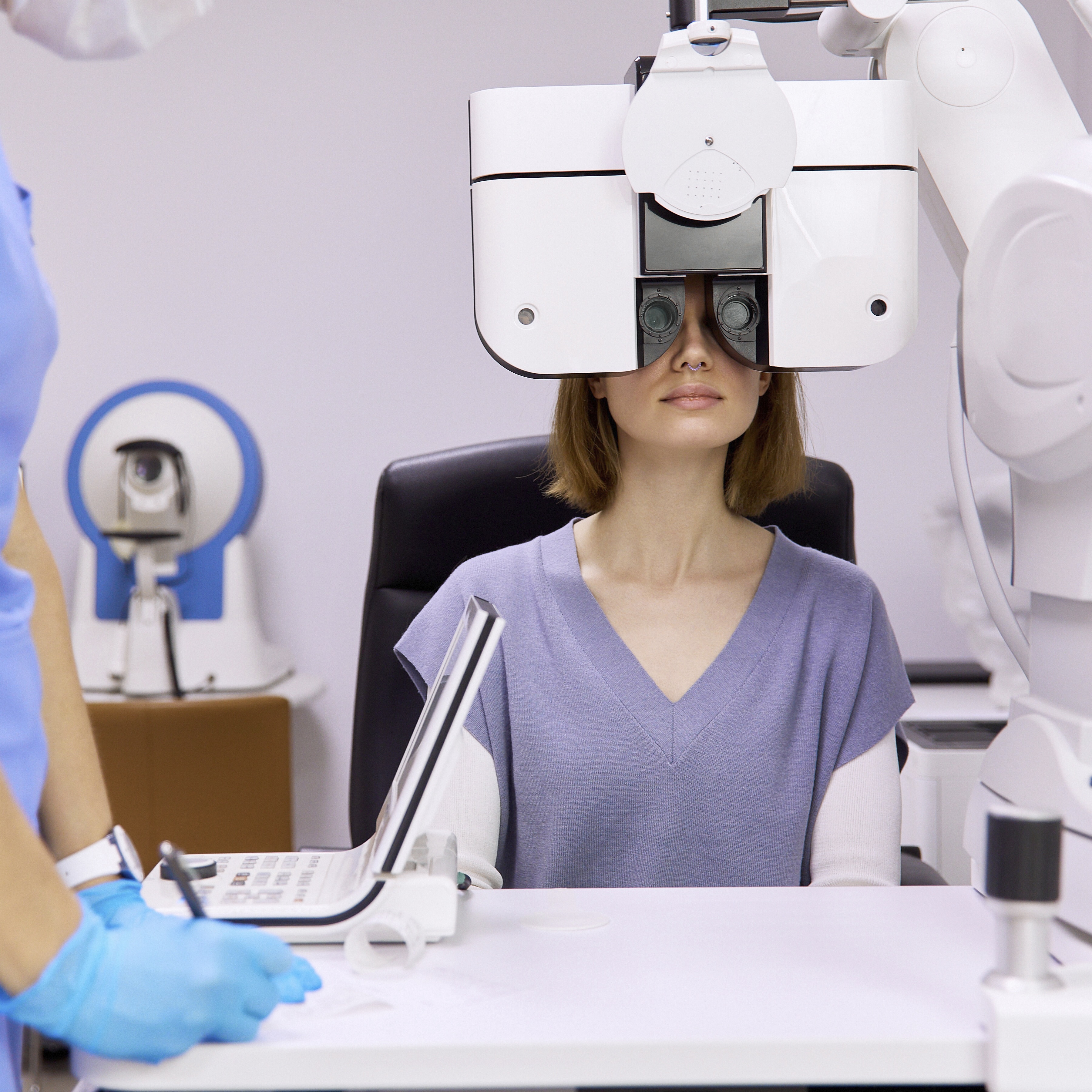 Woman getting her eyes checked