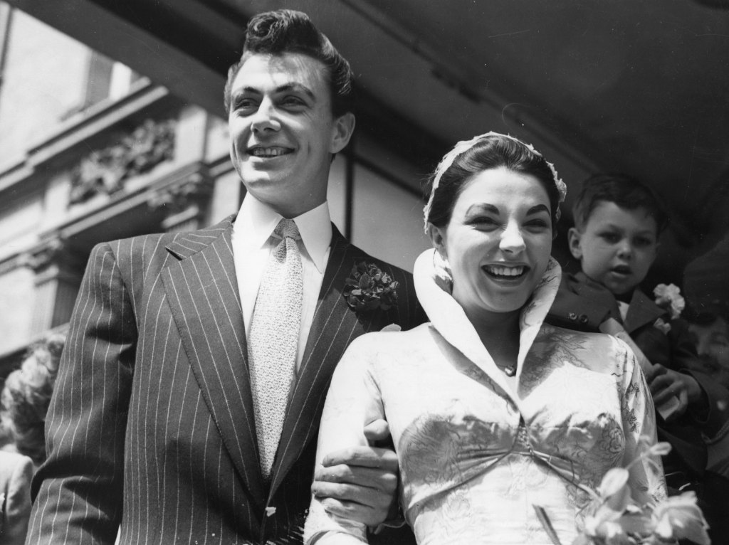 Joan Collins and Maxwell Reed on their wedding day in 1952
