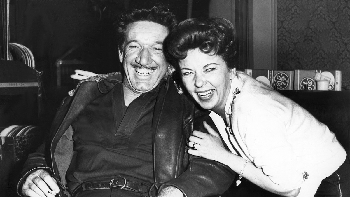 IDA LUPINO, director, hugging actor Richard Boone, on the set of "HAVE GUN WILL TRAVEL," circa 1960.