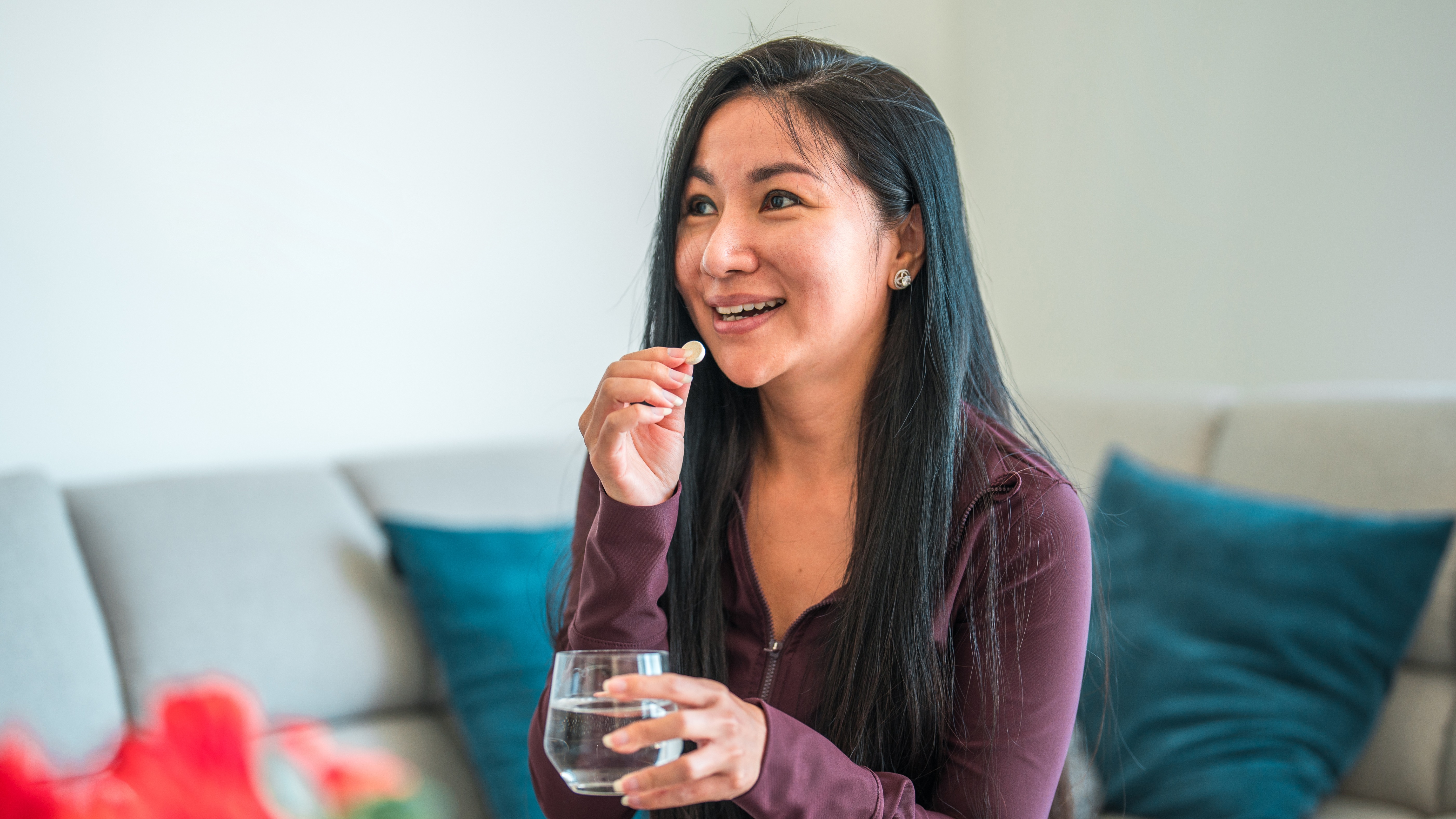 Woman taking probiotics