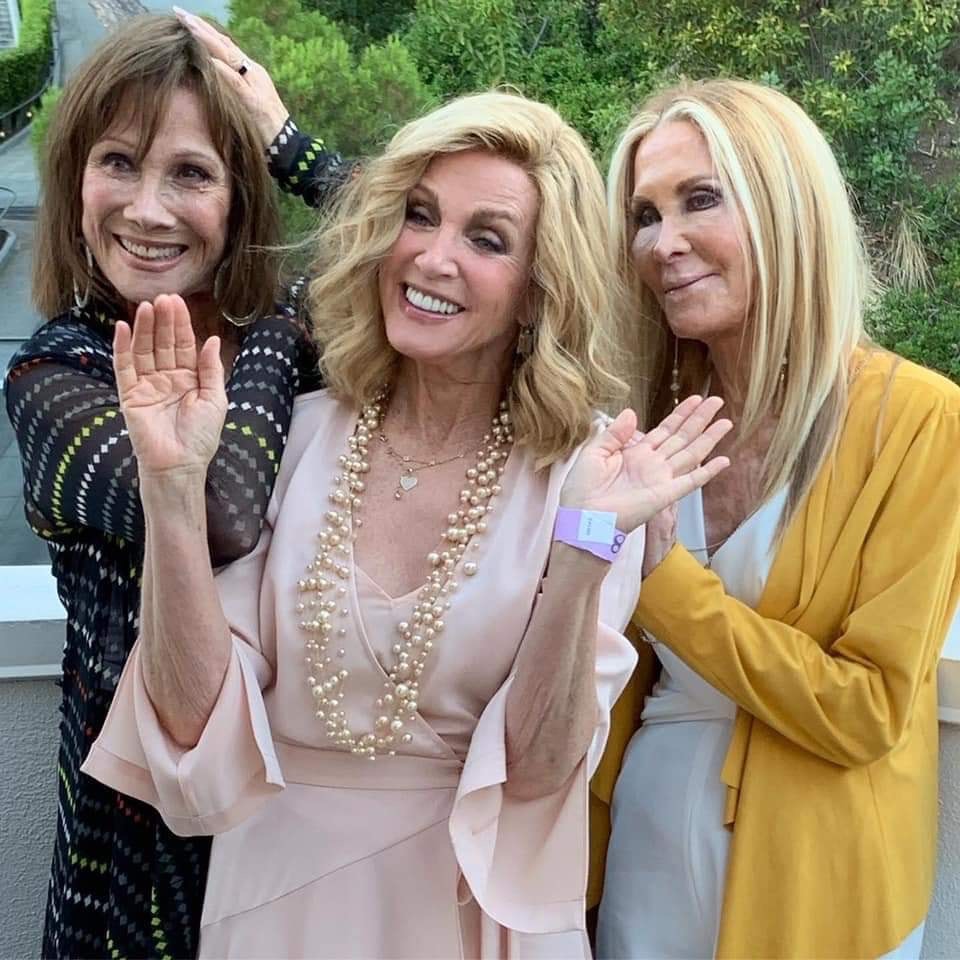 three women smiling