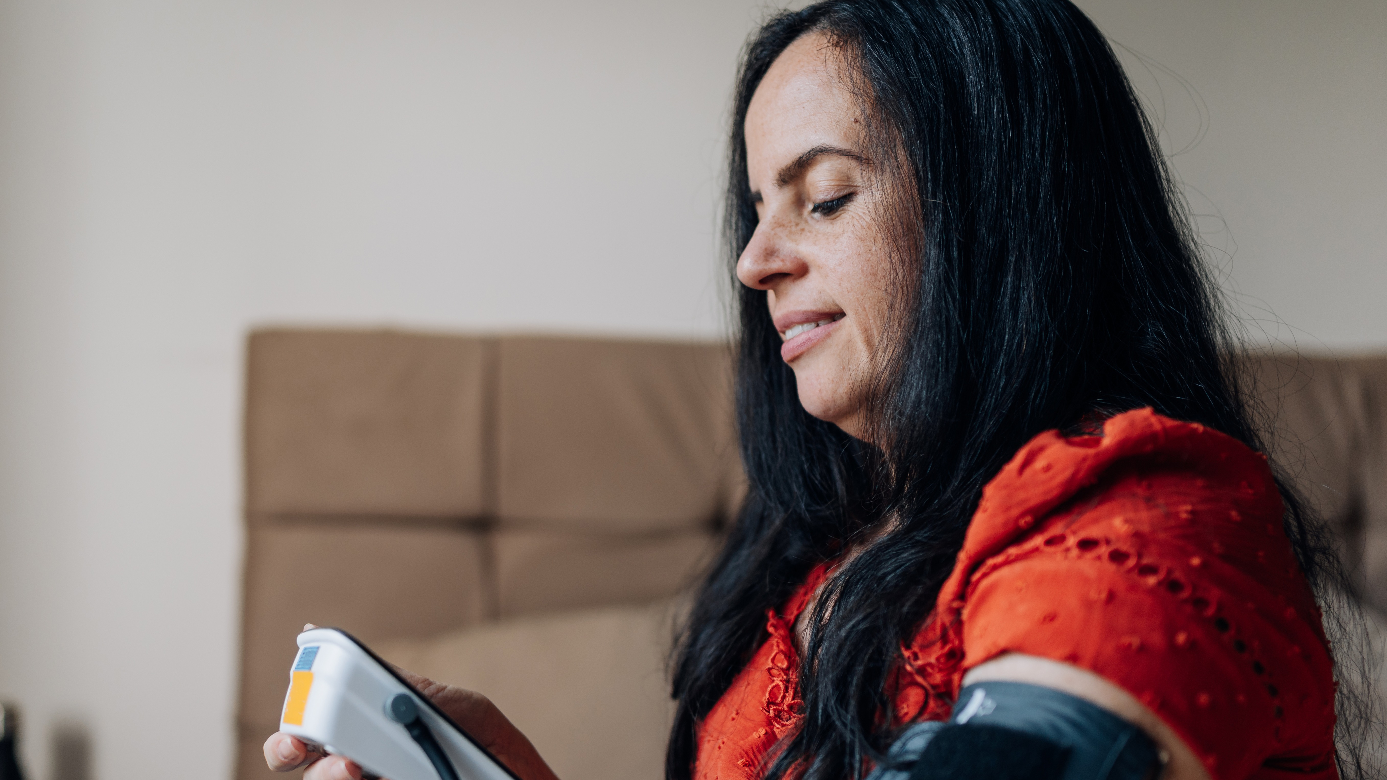 Woman taking blood pressure