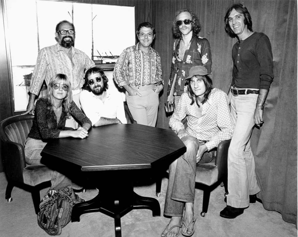 5 band sitting at a table