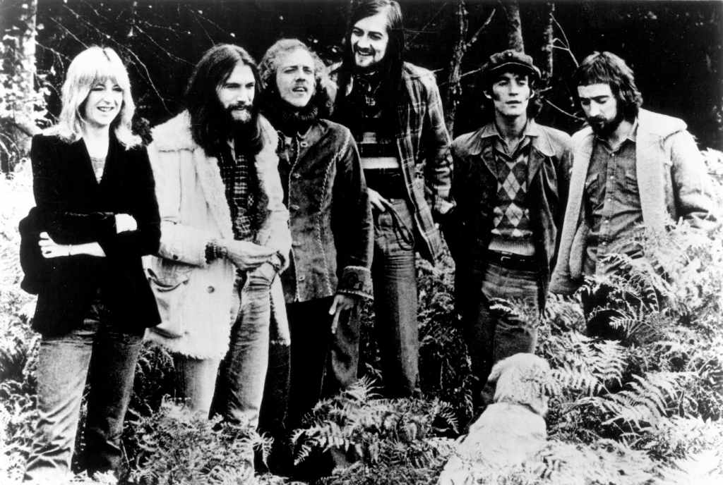 7 band posing for photo