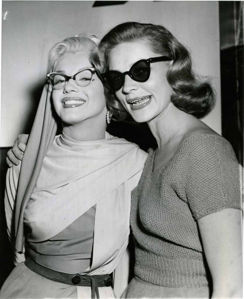 Marilyn Monroe, left, and Lauren Bacall, while filming HOW TO MARRY A MILLIONAIRE, MAY 21 1953