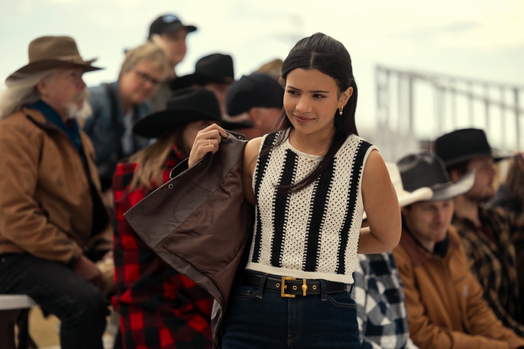 girl putting jacket on