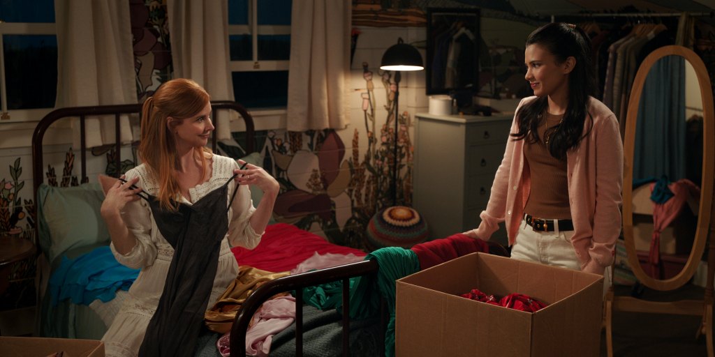 girl and woman going through clothes
