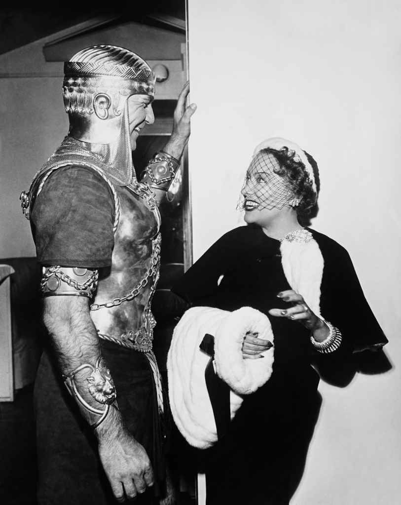 SUNSET BOULEVARD, from left: Henry Wilcoxon in costume for SAMSON AND DELILAH, Gloria Swanson on set, 1950