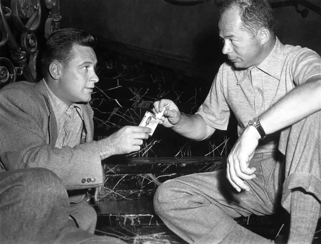 SUNSET BOULEVARD, from left: William Holden, director Billy Wilder, on set, 1950